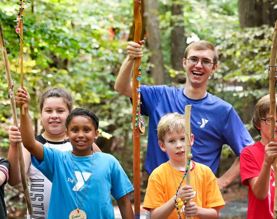 a group of people on a swing