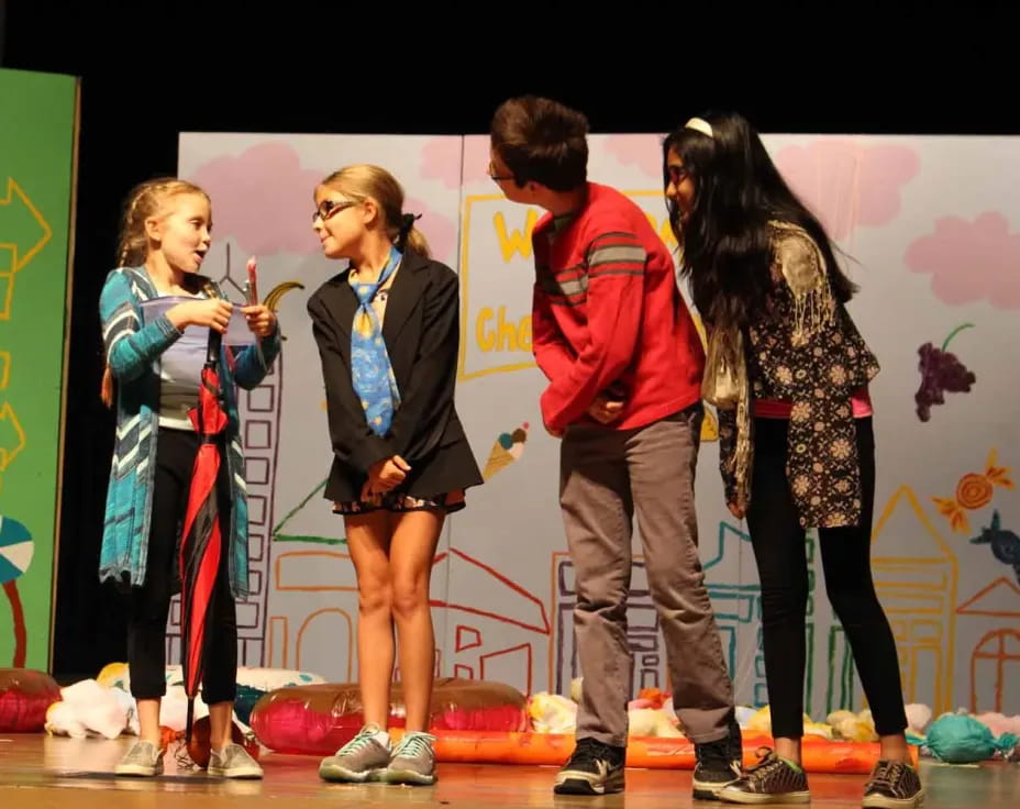 a group of people on a stage