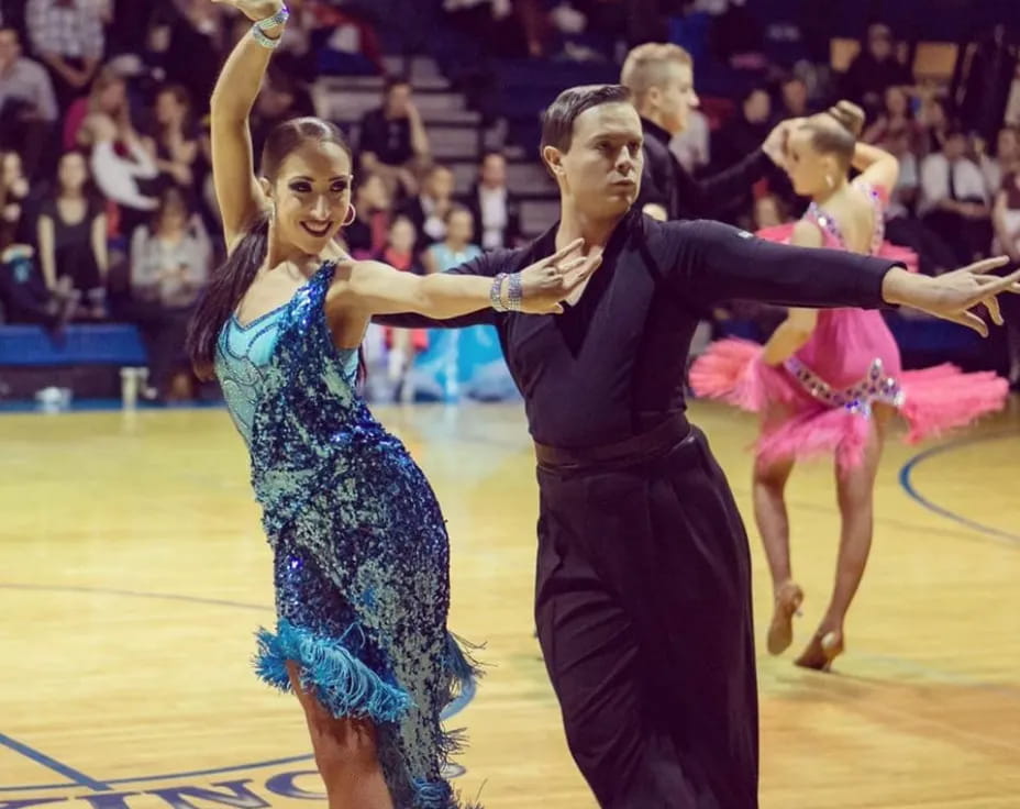 a man and woman dancing