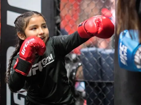 a person wearing boxing gloves