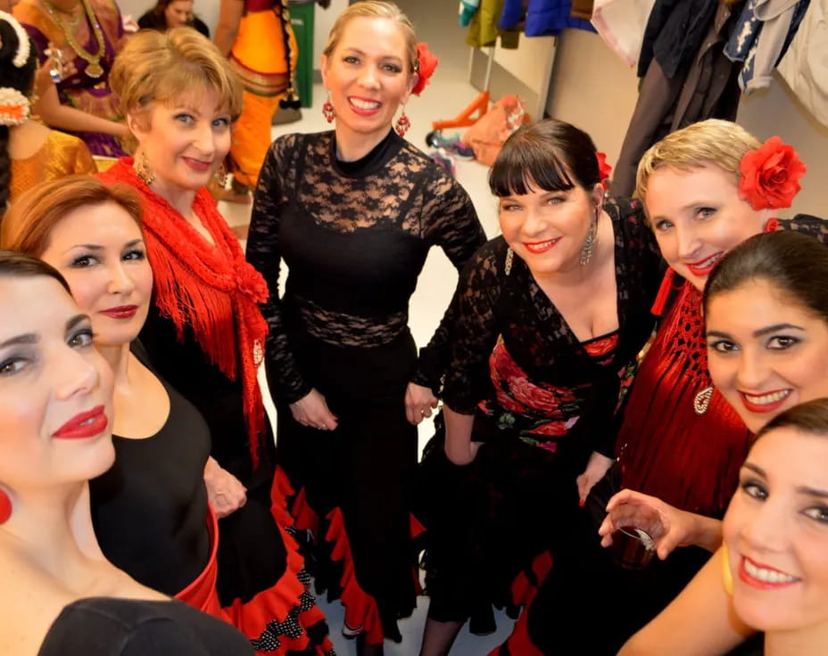 a group of women posing for a photo