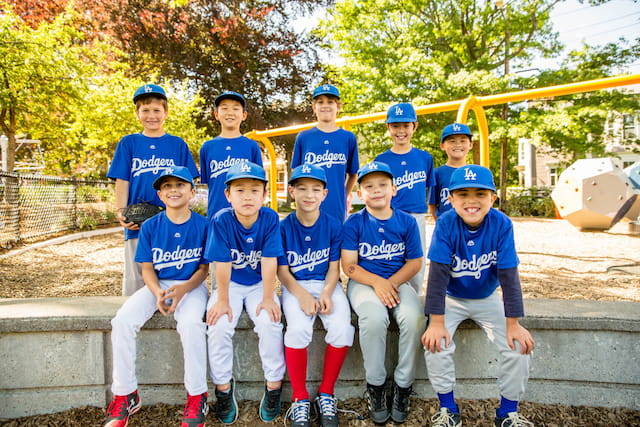 a group of boys in blue uniforms