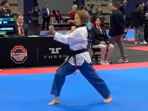 a person in a karate uniform