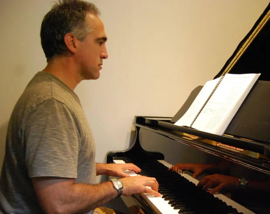 a man playing a piano