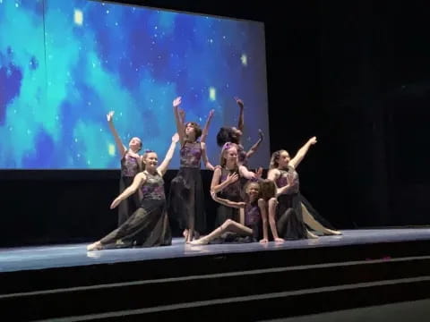 a group of people on a stage