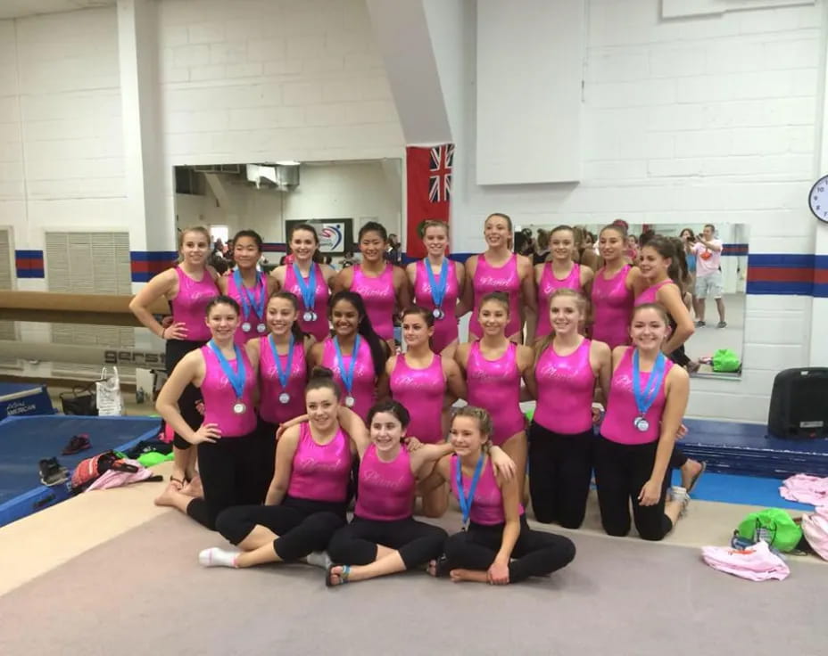 a group of women posing for a photo