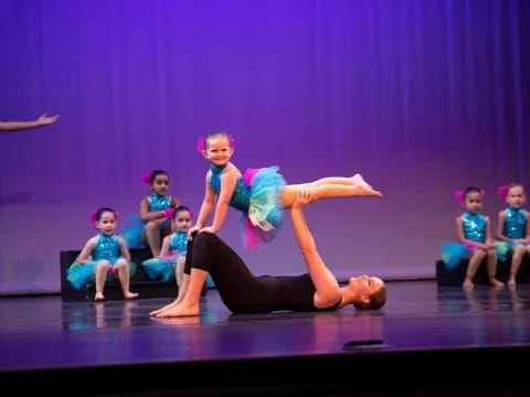a group of people on a stage