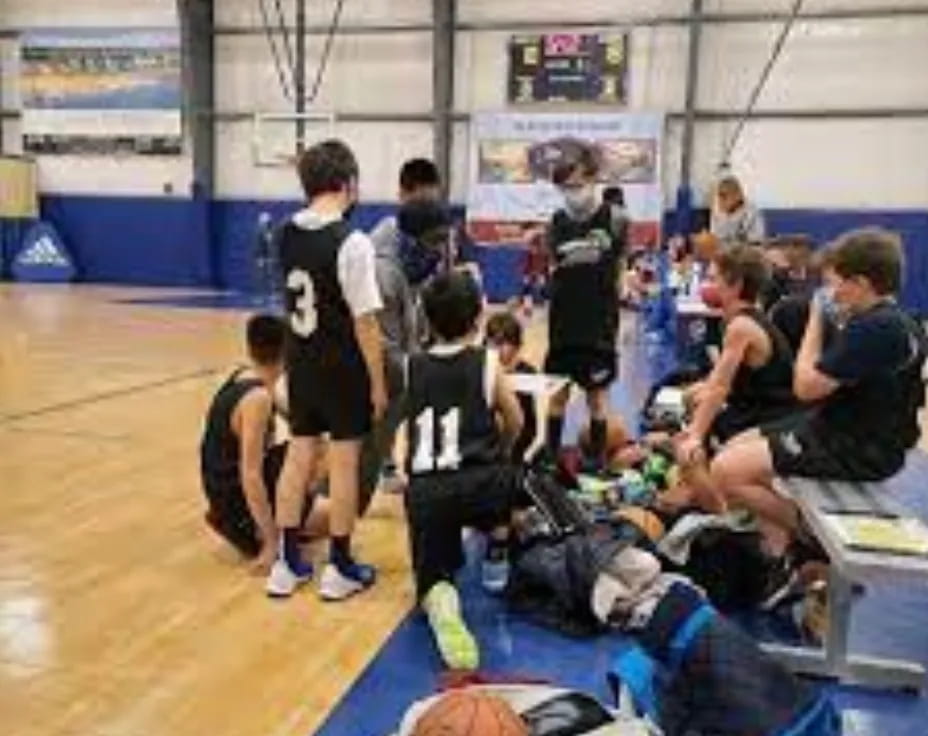 a group of people in a gym