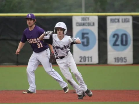 a baseball player throwing a ball