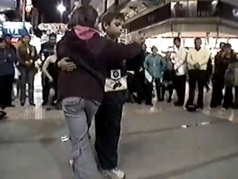 a man holding a woman