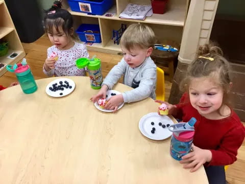 children eating at a table
