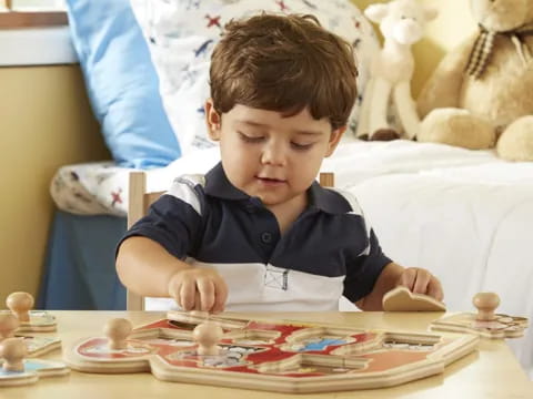 a boy sitting at a table