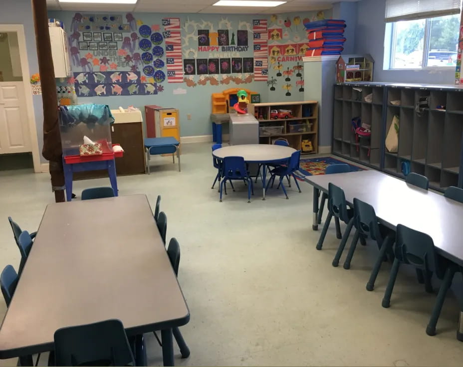 a classroom with desks and chairs