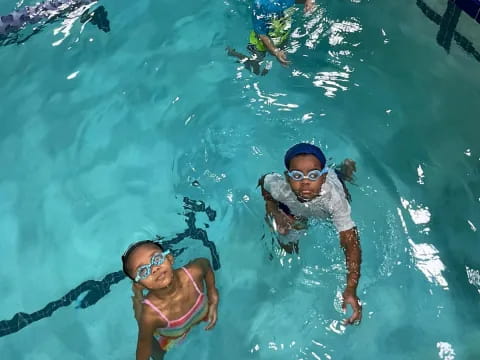 a group of people in a pool