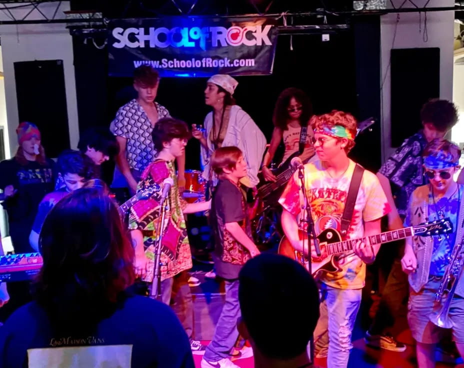 a group of people on a stage