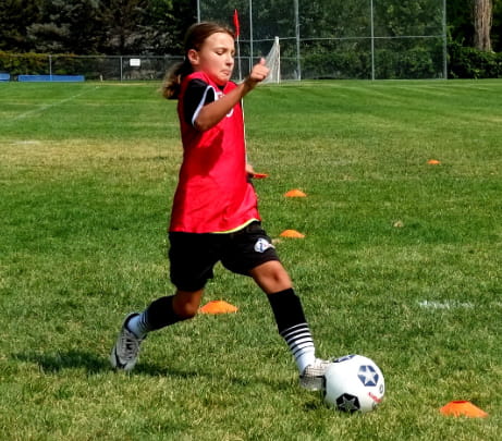 a girl playing football