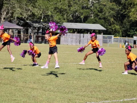 a group of girls in a field