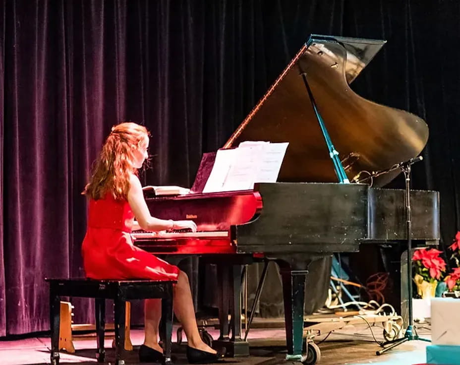 a person playing a piano