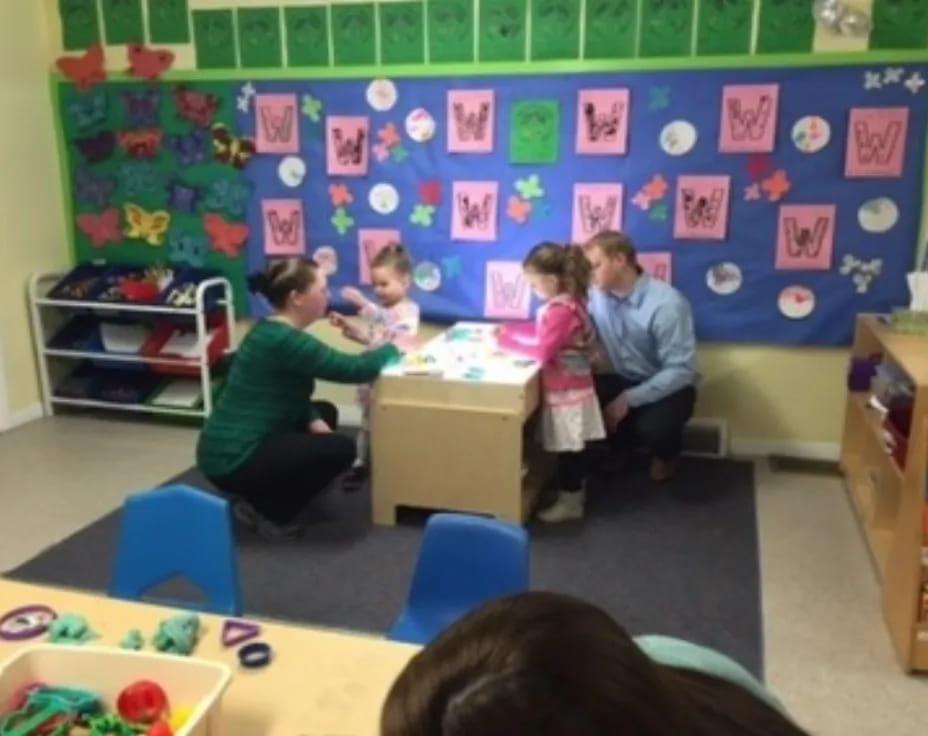 a group of children in a classroom