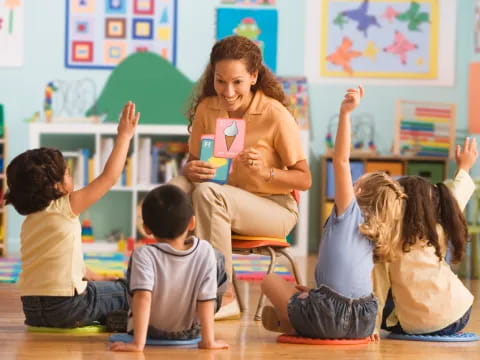 a teacher teaching her students