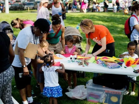 a group of people around a table