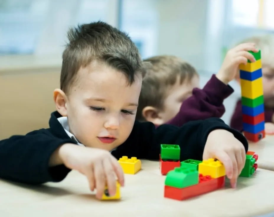 a few children playing with toys