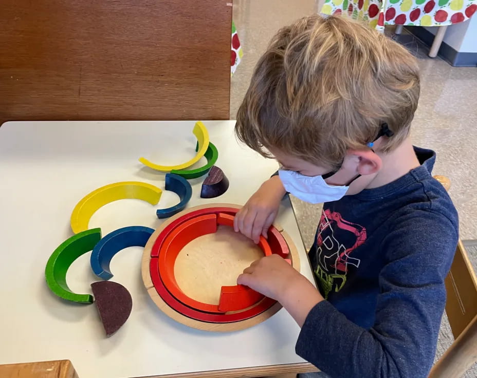 a child playing with a toy