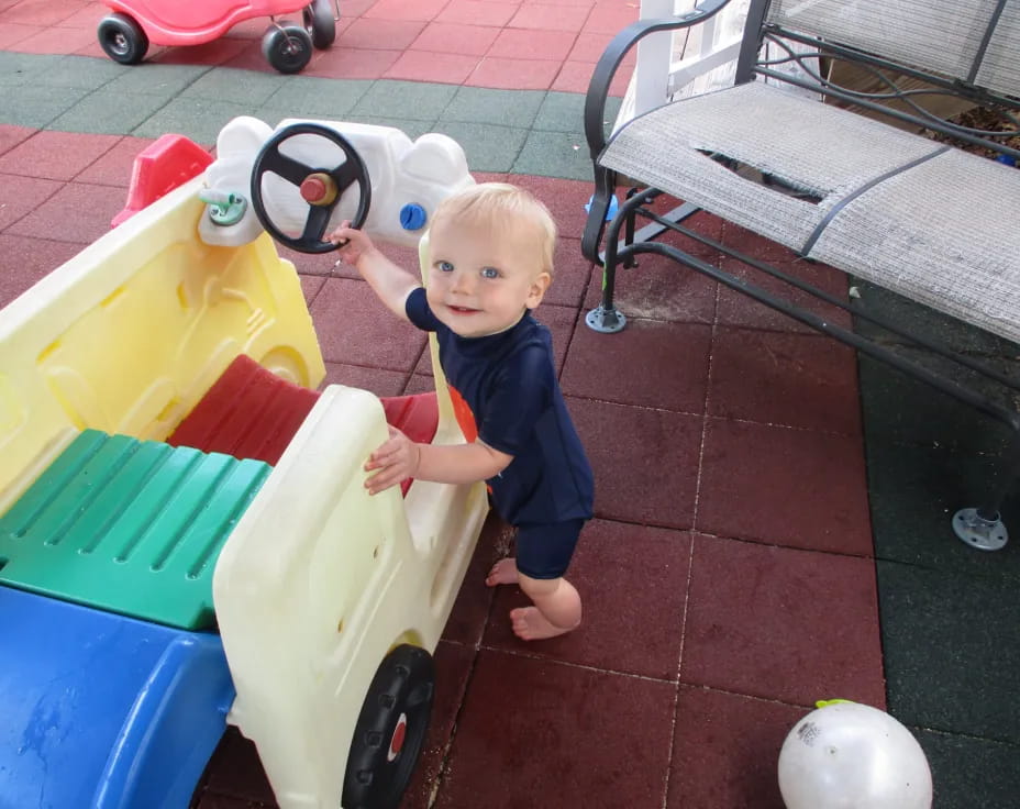 a baby playing with toys