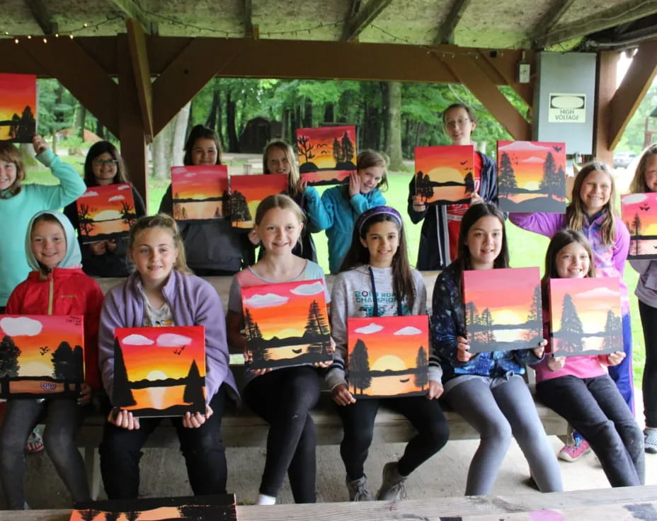 a group of children holding signs
