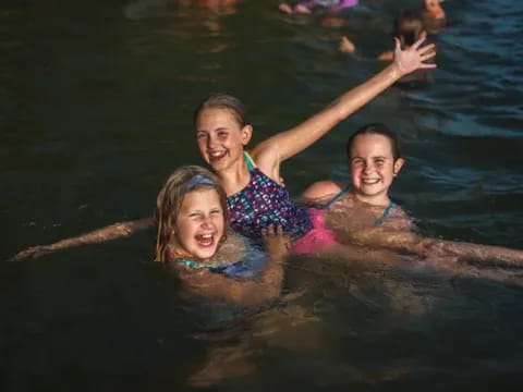 a group of people in the water