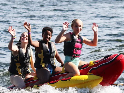 a group of people on a raft