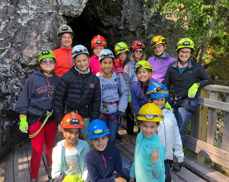 a group of people wearing helmets
