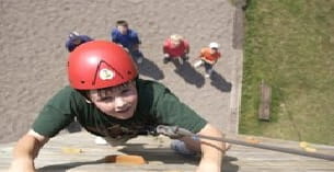 a person swinging a baseball bat