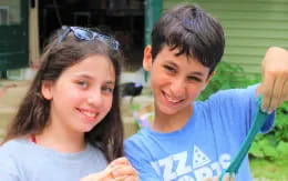 a boy and girl smiling