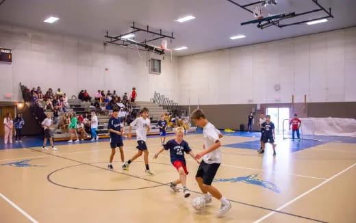 a group of people playing football