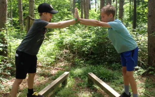 two boys in the woods