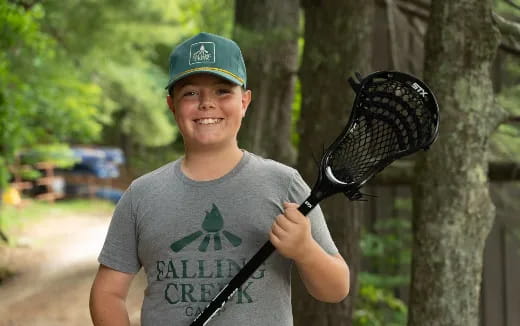 a boy holding a bat