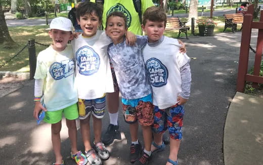 a group of kids posing for a picture