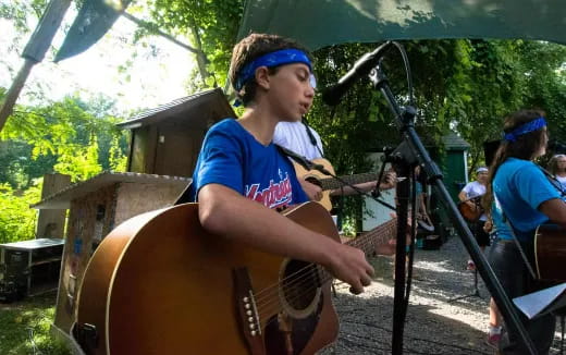 a man playing an instrument