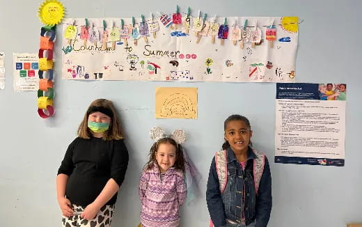 a group of girls wearing clothing