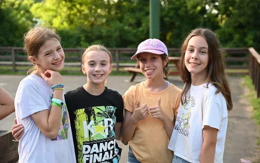 a group of girls posing for a photo