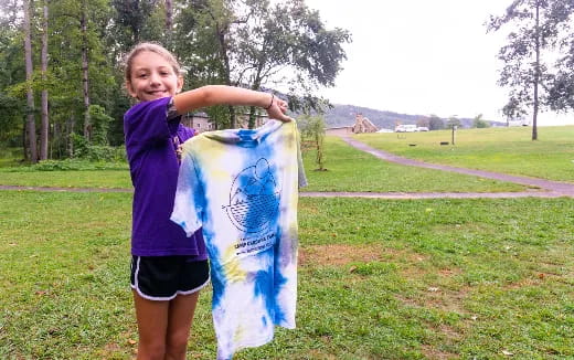 a girl holding a flag