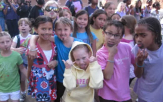 a group of children with their mouths open