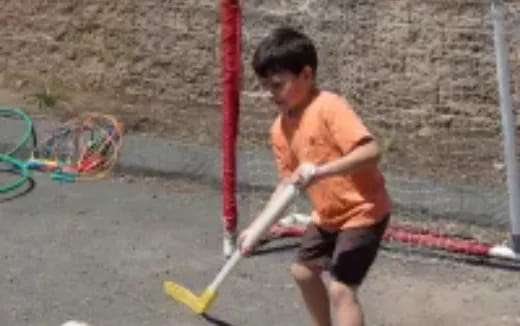 a boy playing hockey