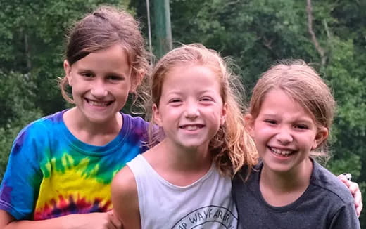 a group of girls smiling