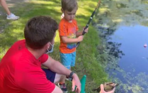 a couple of boys fishing