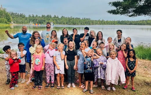a group of people posing for a photo