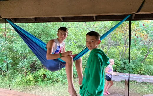 a boy and girl posing for a picture