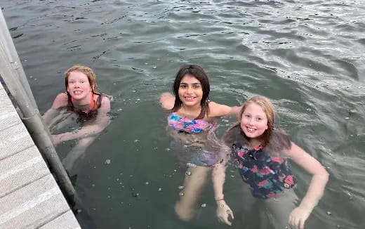 a group of children in the water