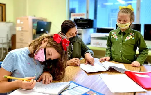 a group of children in a classroom